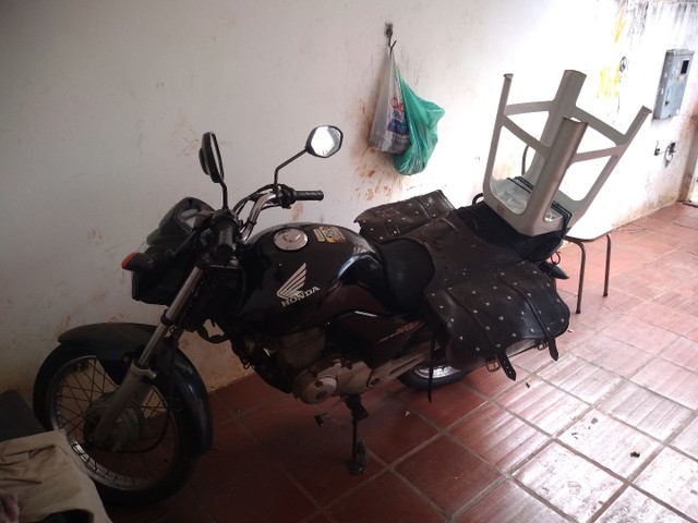 TROCO MOTO FAN 150 2015
