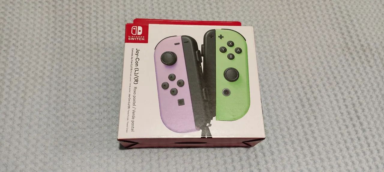 Joy con Nintendo switch na cor verde e roxo pastel 