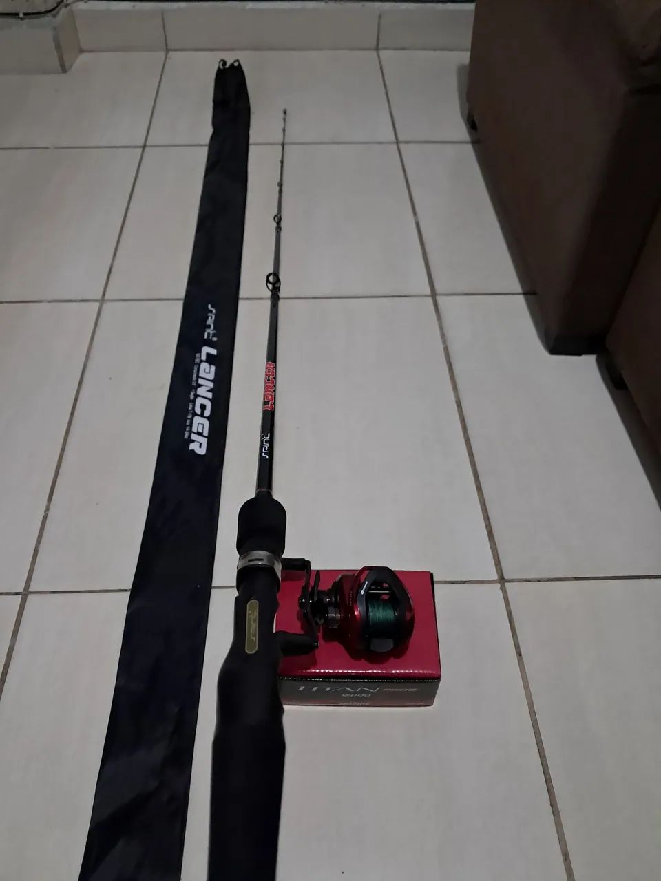 Vendo carretilha e vara, conjunto novo - Foto 6
