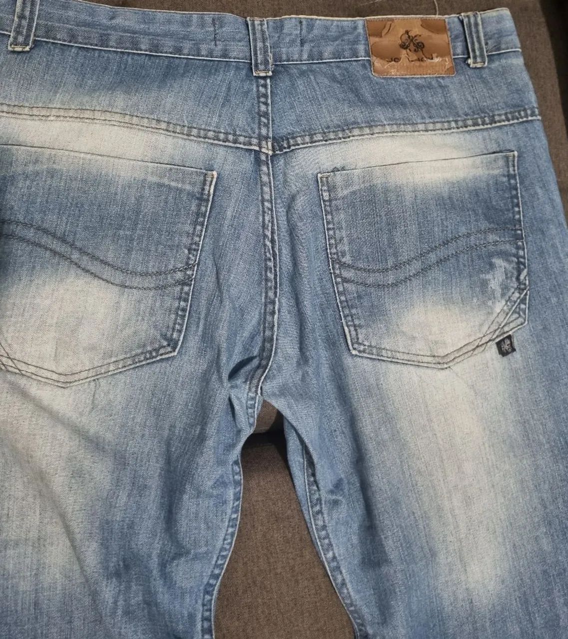 Calça jeans john john