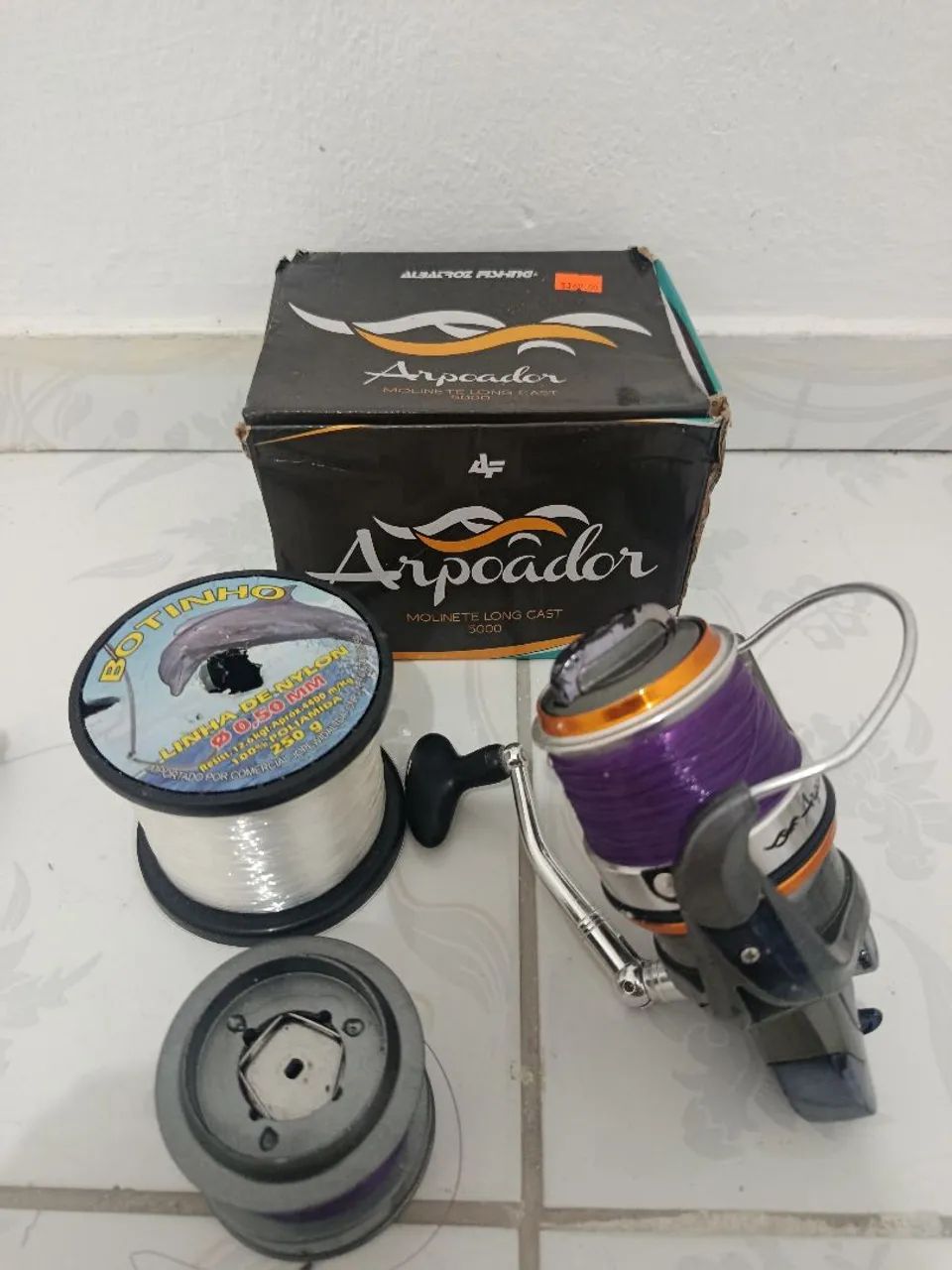Molinete arpoador com chumbada linha anzóis isca artificial 