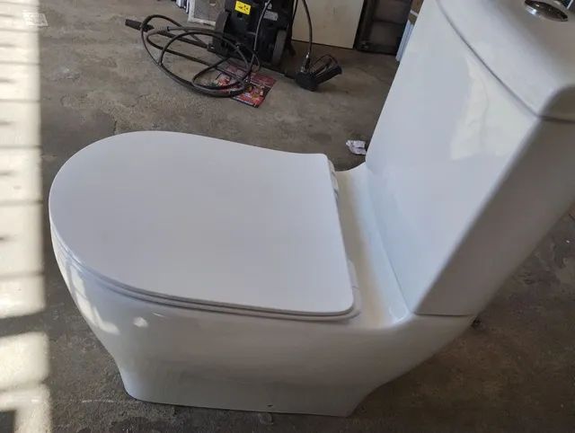 Kit vaso sanitário e cx acoplada e assento slim celite  - Foto 2
