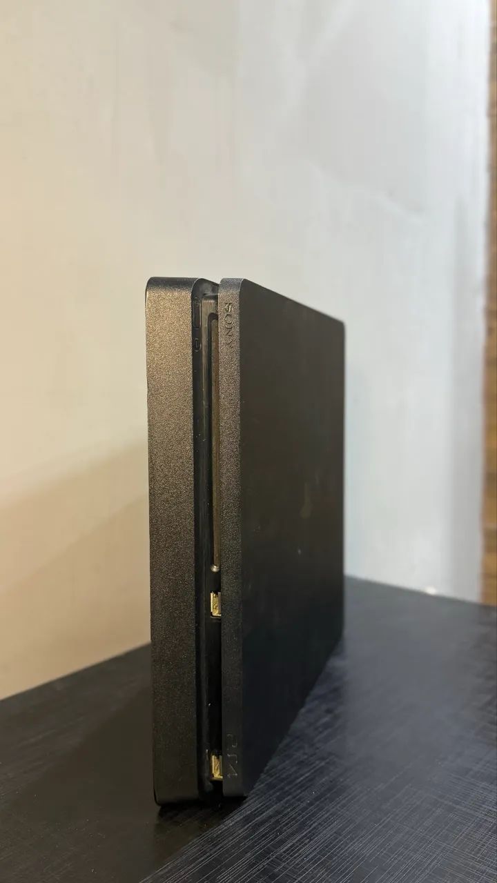 PS4 Slim - 1TB + 2 Jogos  - Foto 4