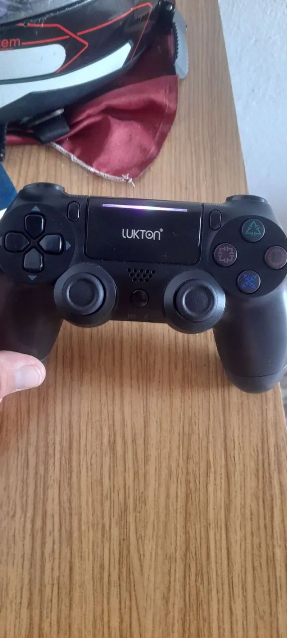 Controle de ps4 zero pra bota preço 