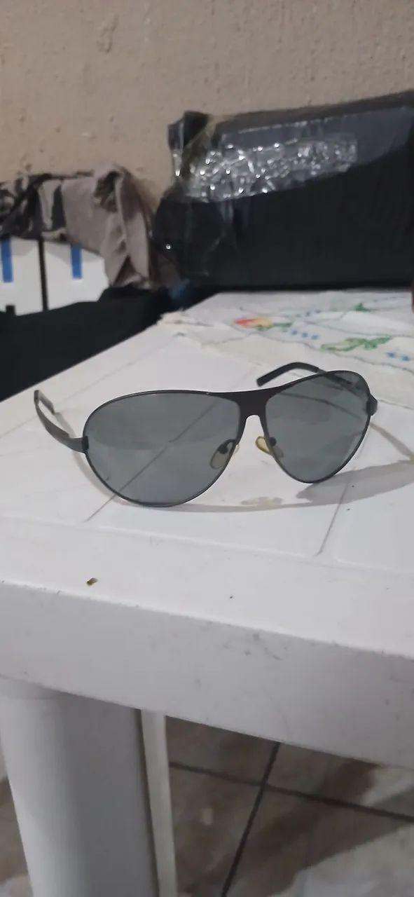 Óculos Triton Titanium lente polarizada em ótimo estado  - Foto 2
