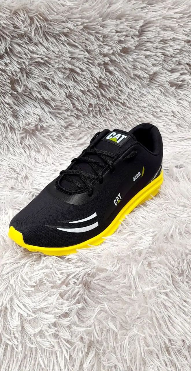 Tênis caterpillar preto C amarelo  - Foto 3