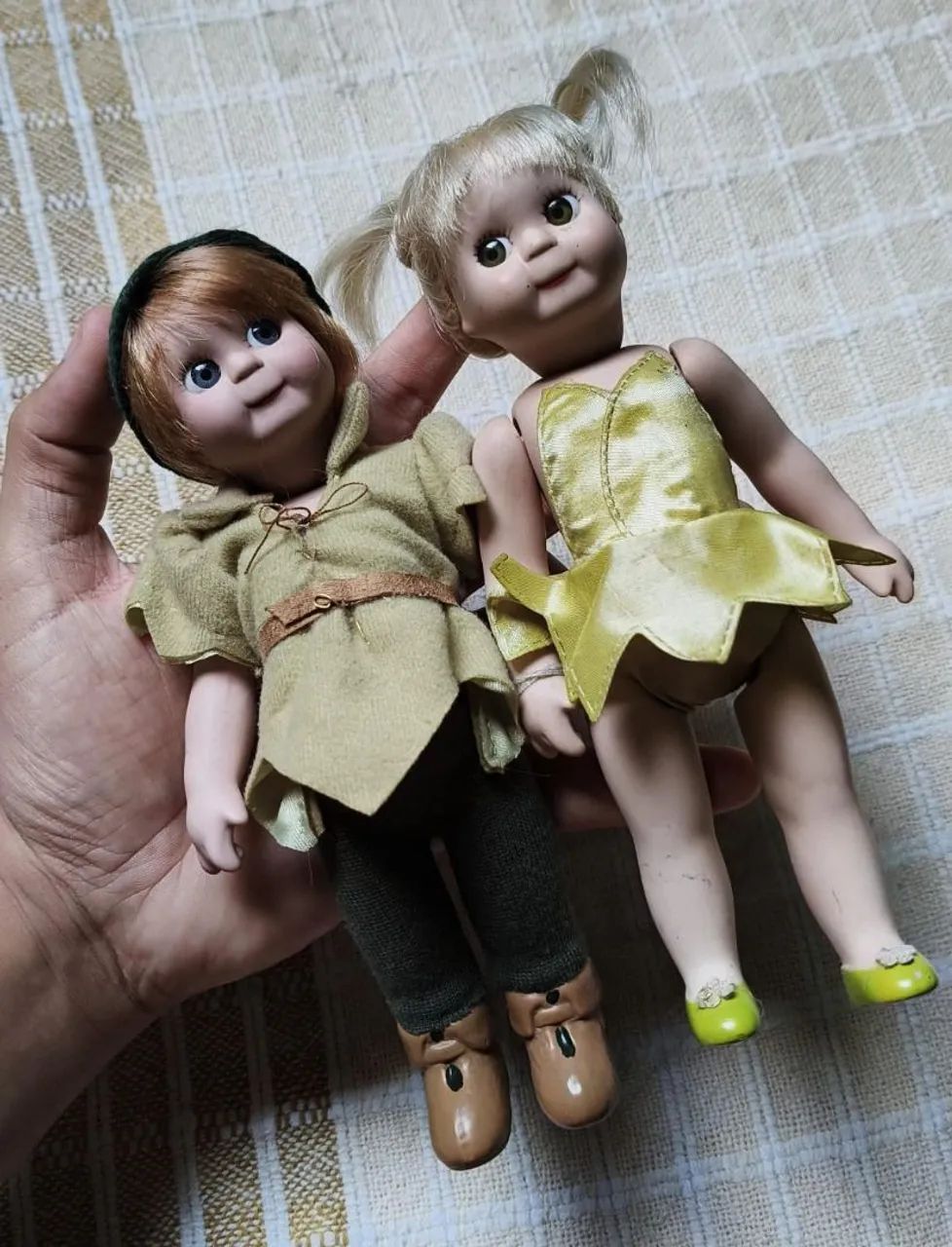 Bonecos de porcelana Peter pan e cininho