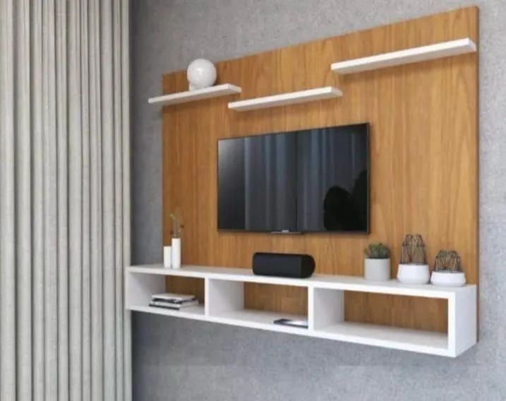 Painel para TV  com nichos e prateleiras todos os tamanhos.