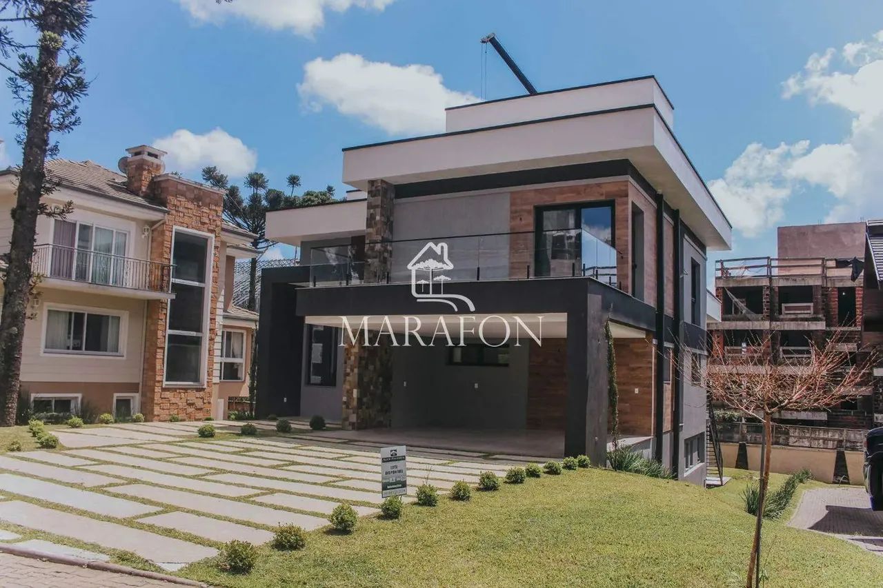 CHARMOSA CASA NO CONDOMÍNIO ALTOS PINHEIROS EM CANELA