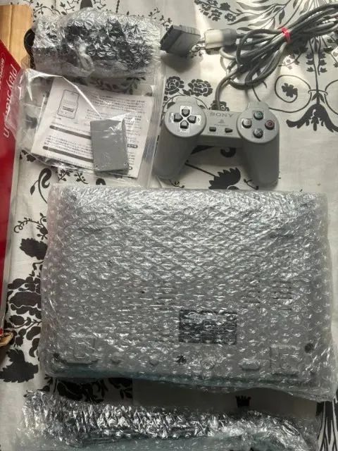 PlayStation SCPH-5500 com caixa, cabos, fonte, cartão de memoria e controle, tudo original - Foto 4