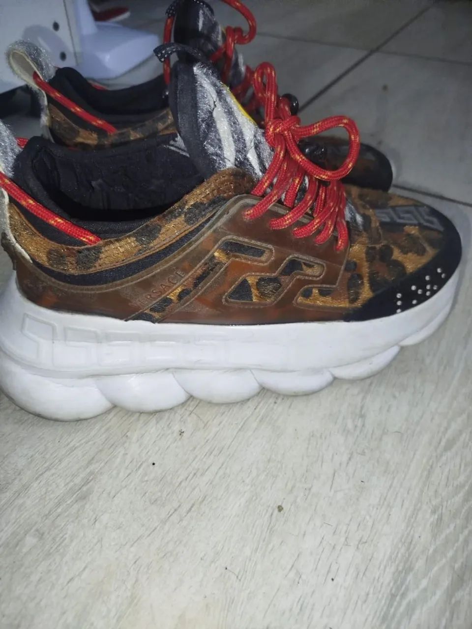 Versace chain reaction