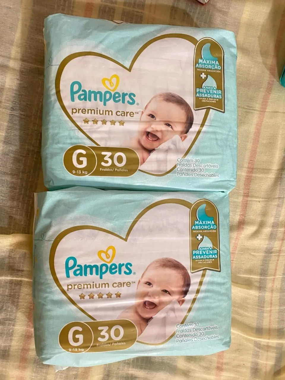 Pampers premium care 75,00 cada
