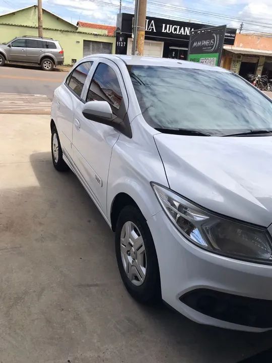 41.000.00 Onix LT1.0 2014 único dono chave reserva e nota fiscal - Foto 2
