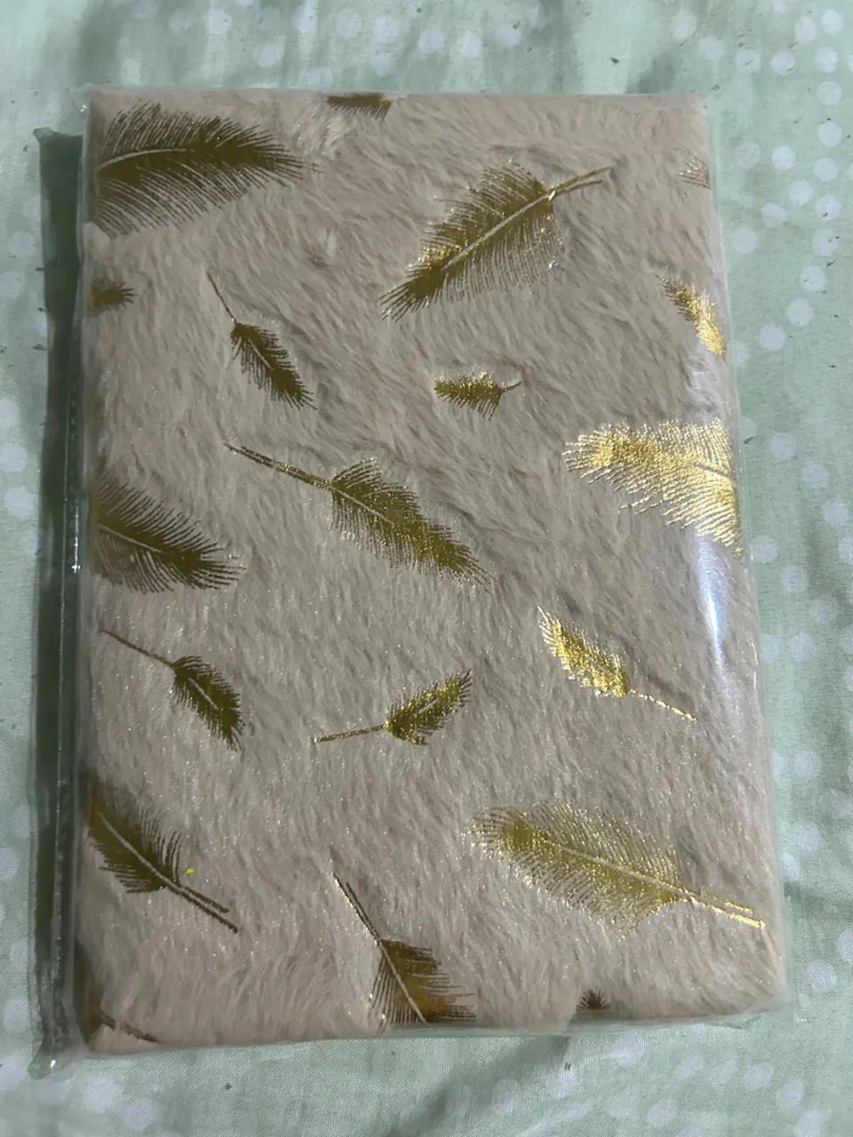 Caderneta de pelúcia 