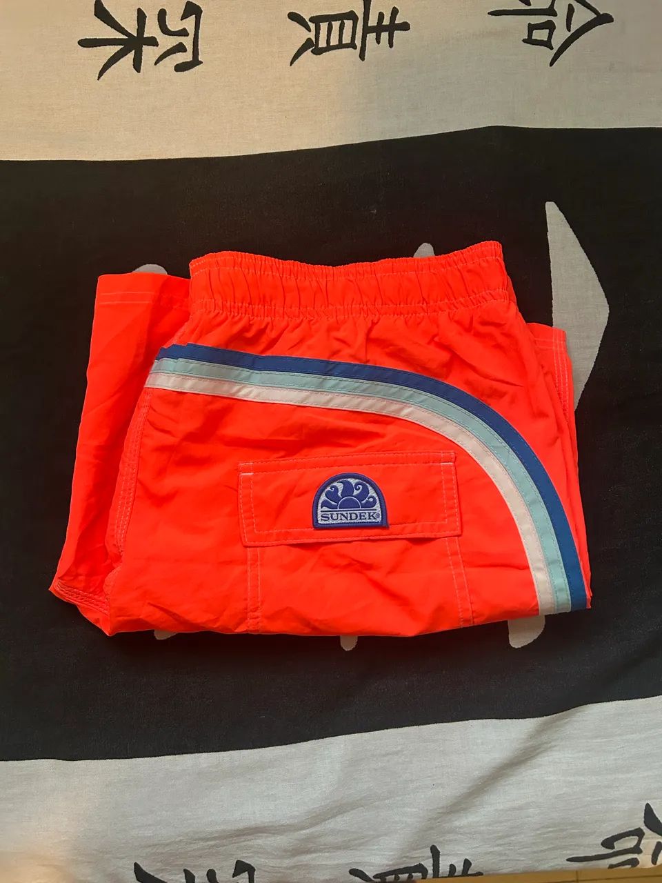 SUNDEK COM BOLSO E ELÁSTICO