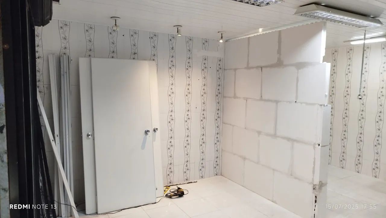 White partition doors with locks, hinges, and hardware