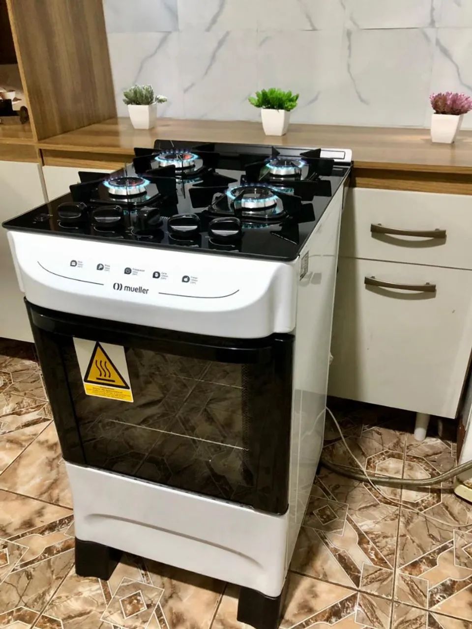 Vendo fogão modelo Mueller mesa de vidro de 04 BOCAS  - Foto 5