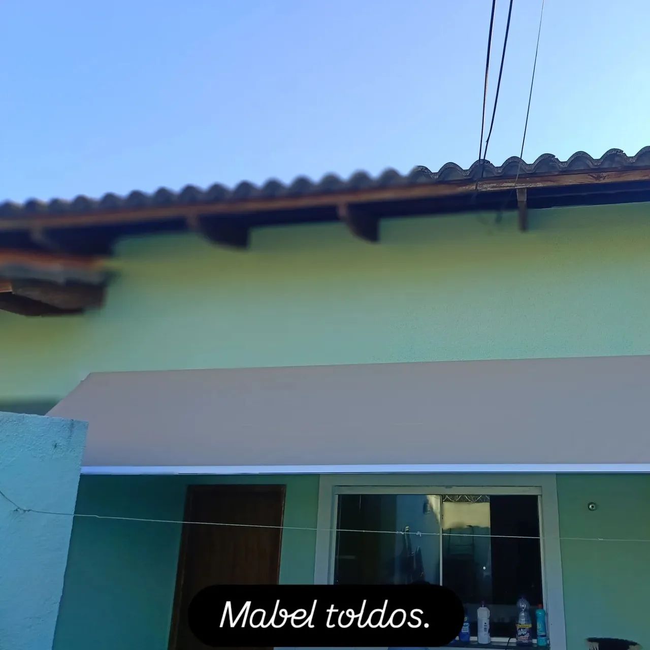 toldo de mola em lona PVC