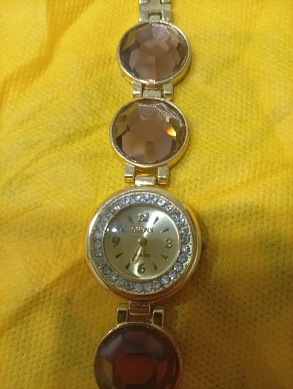 Relógio onenx feminino quartzo,analógico, dourado  - Foto 4