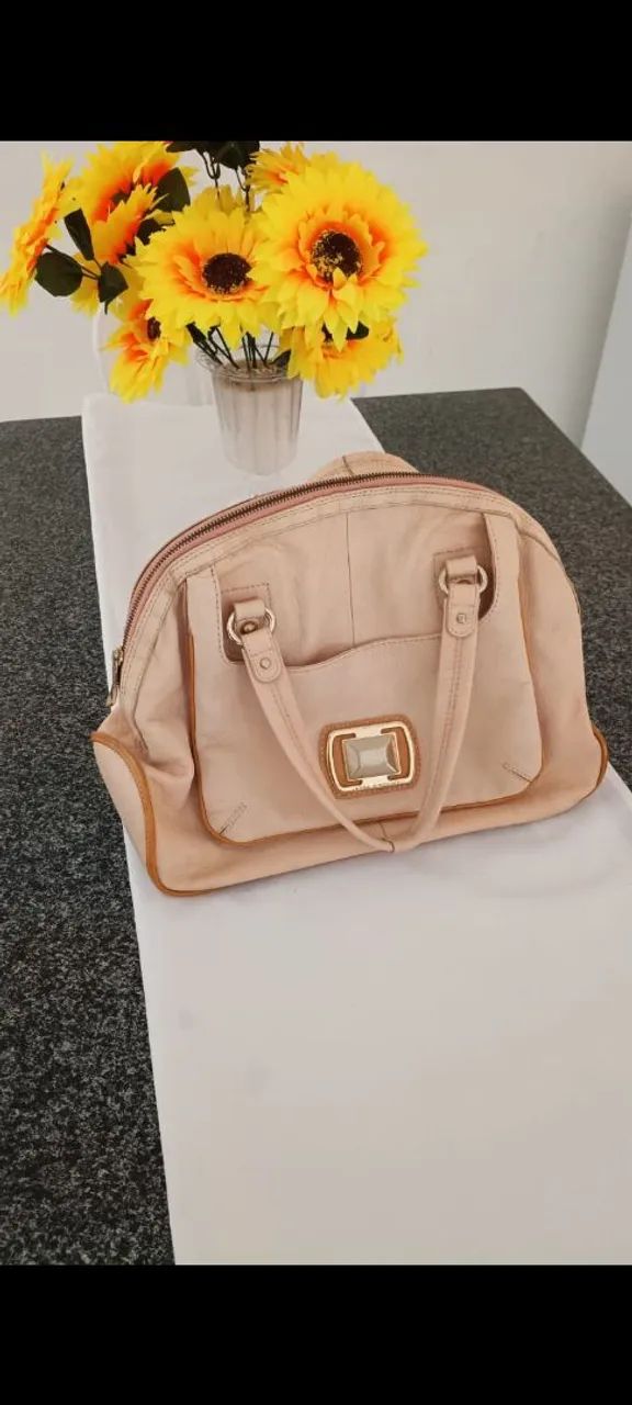 Bolsa de couro. Dou desconto de 50,00