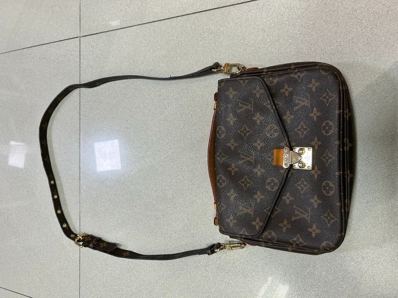     Bolsa Louis Vuitton Pochette Métis Monogram Marrom