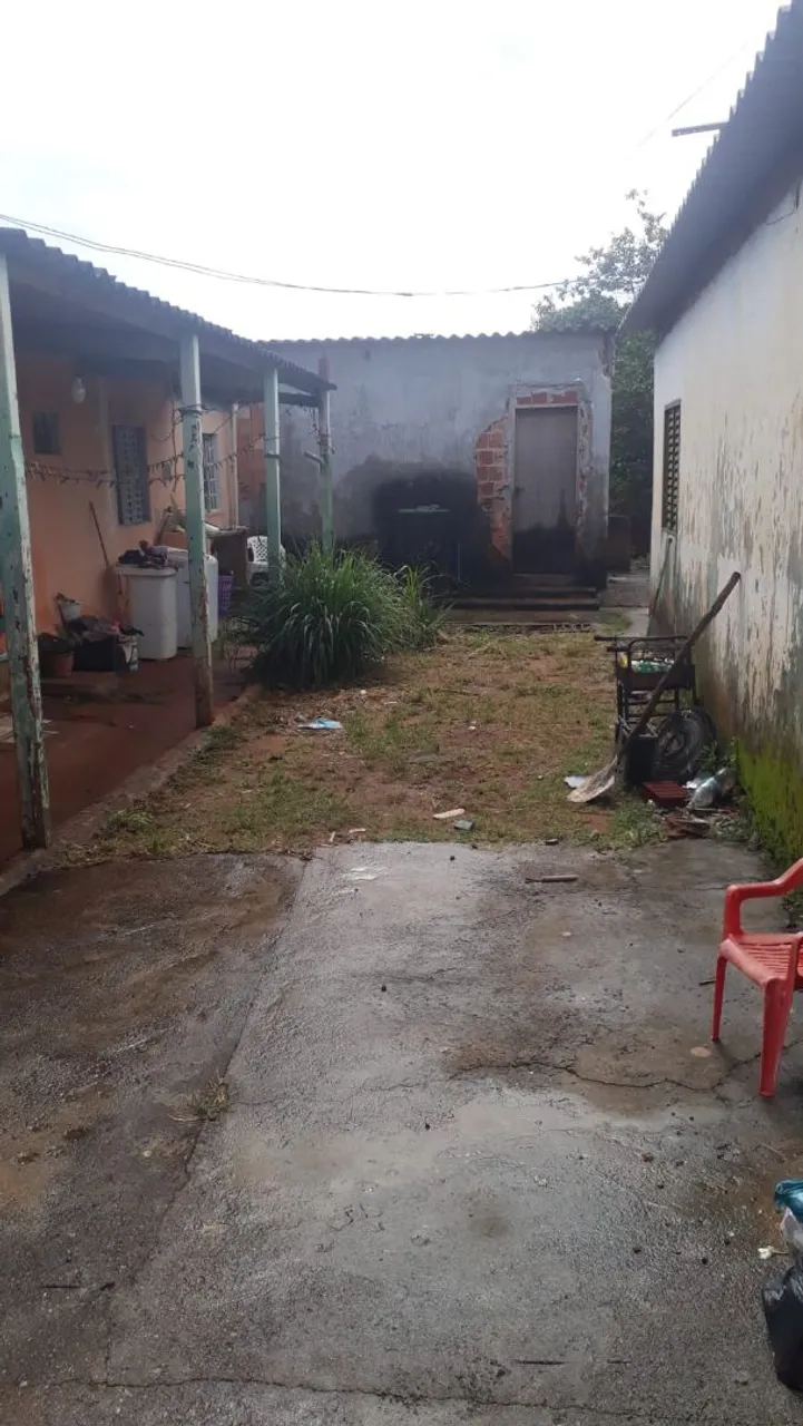 Vendo lote com 3 casas