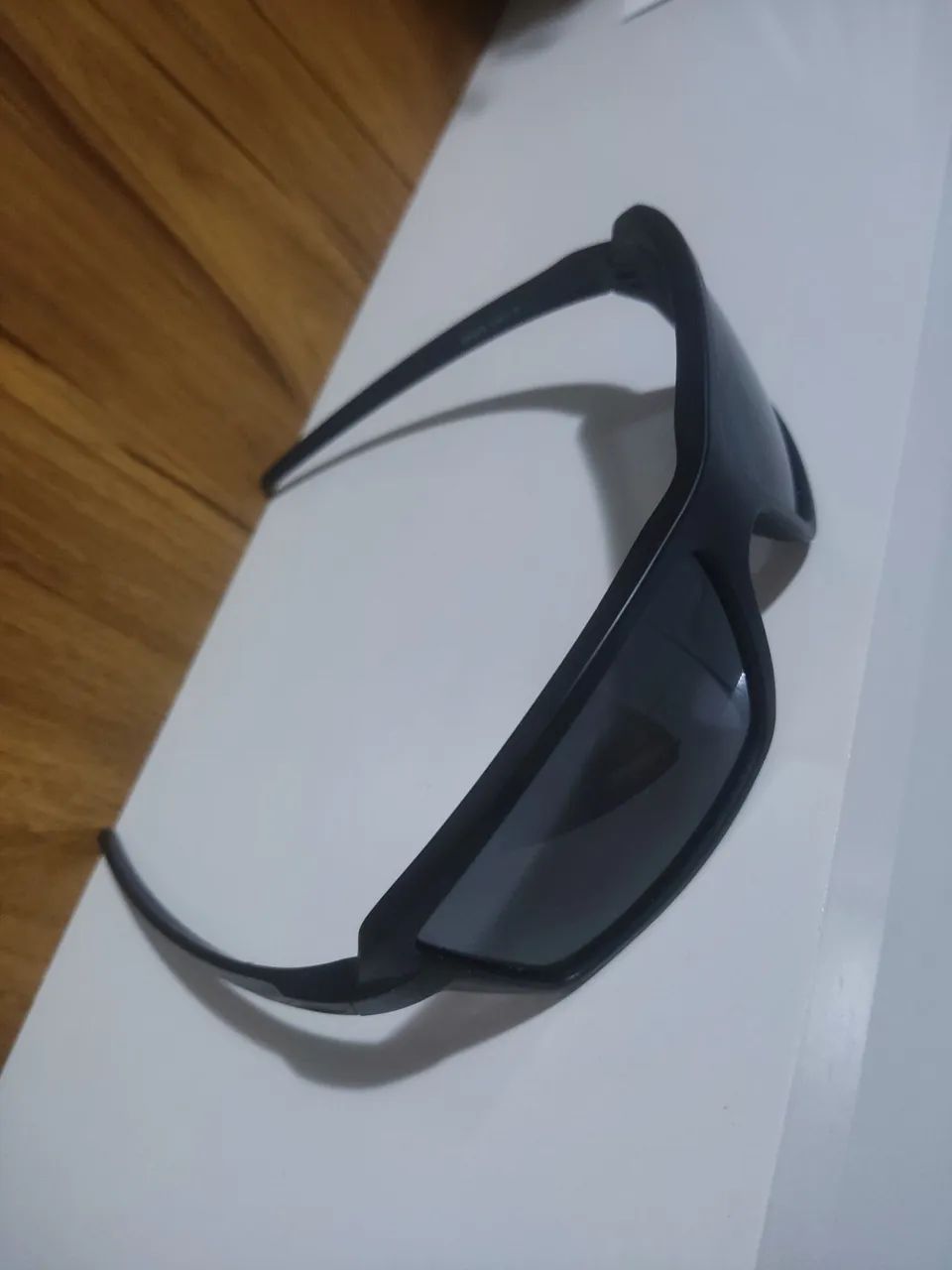 Óculos de sol preto Oakley original novo e com nota - Foto 3