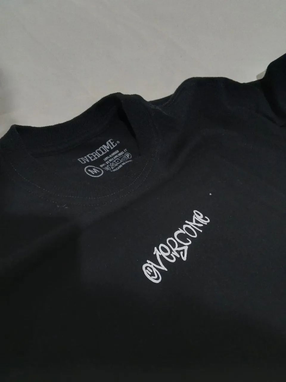 camisa overcome
