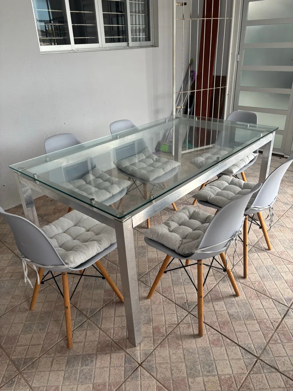 Mesa aço inox , com tampo blindex com seis cadeiras