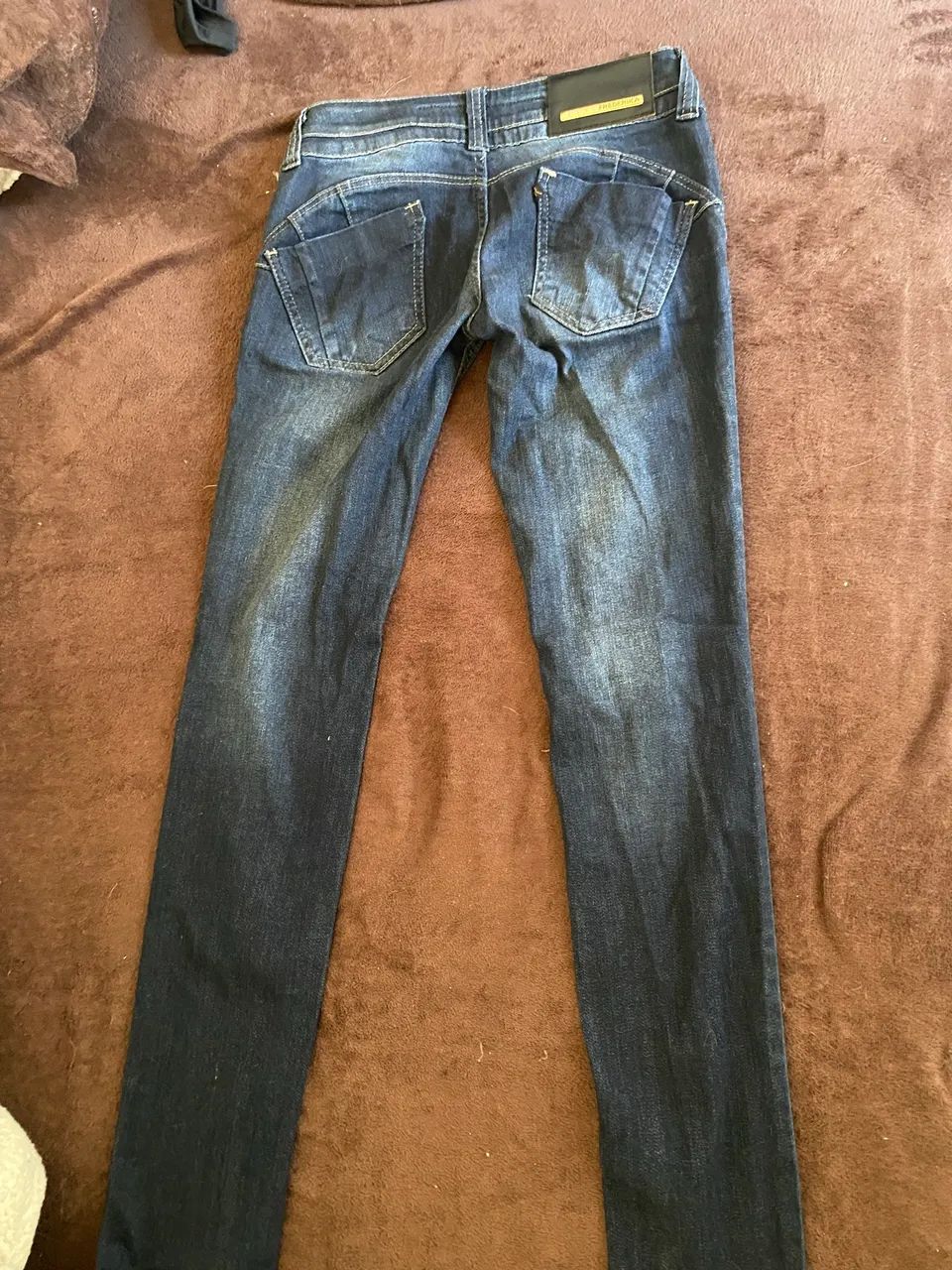 Calça jeans skinny, cintura baixa. - Foto 5