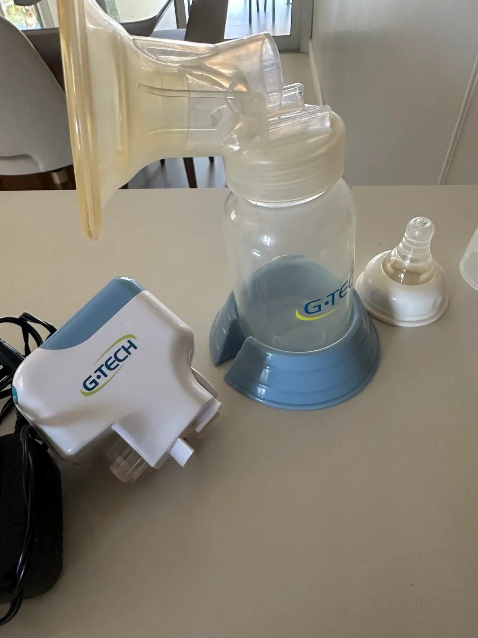 Máquina elétrica de tirar leite
