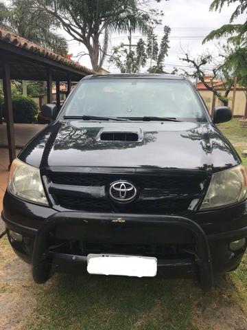 Toyota Hilux CD SR 4x2 4 portas preta em perfeito estado - Foto 3
