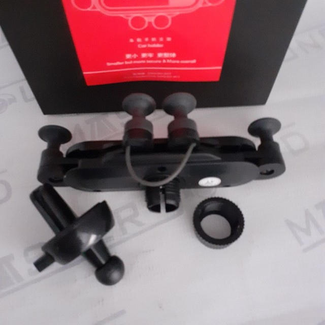 Suporte veícular   para celular. Com fixação na saída do ar.novo. - Foto 3