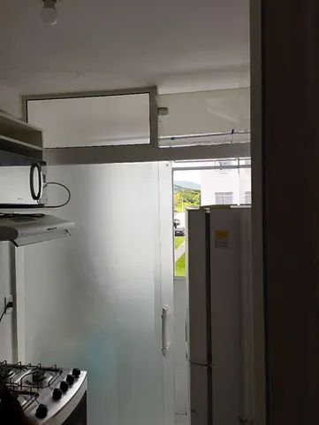 Porta de vidro para área de serviço apartamento 
