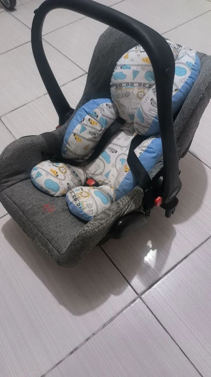  Bebê conforto com almofada redutora 