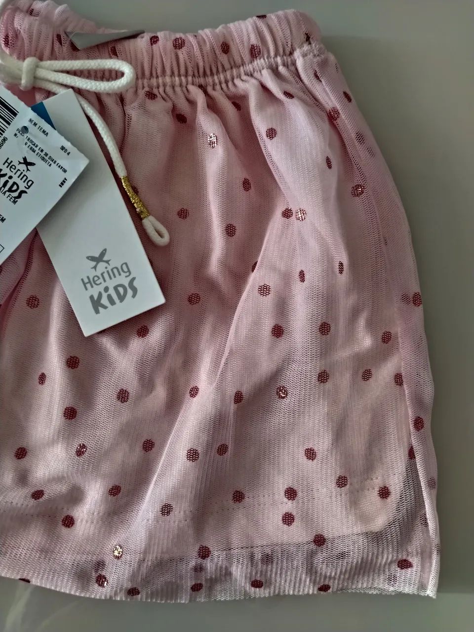 Saia de tule infantil.NOVA! Possui forro 100% algodão, elástico no cós e estampa de poás. - Foto 2