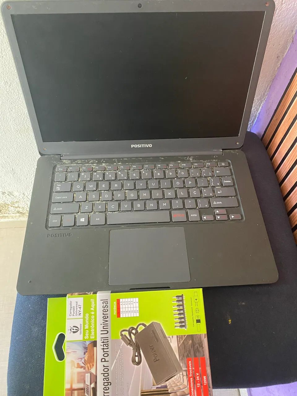 Vendo ou troco notebook positivo para retirada de peça e carregador universal  - Foto 2