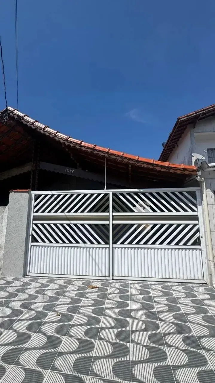 Casa com 2 dormitórios à venda, 70 m² por R$ 399.000,00 - Maracanã - Praia Grande/SP