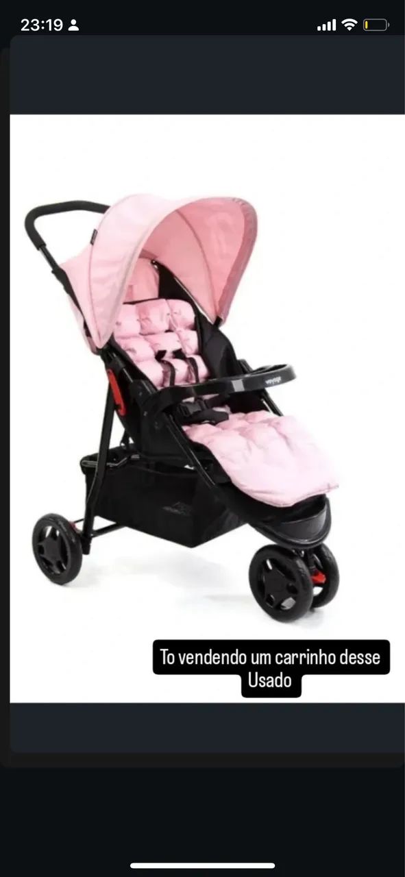 Carrinho de bebê rosa 