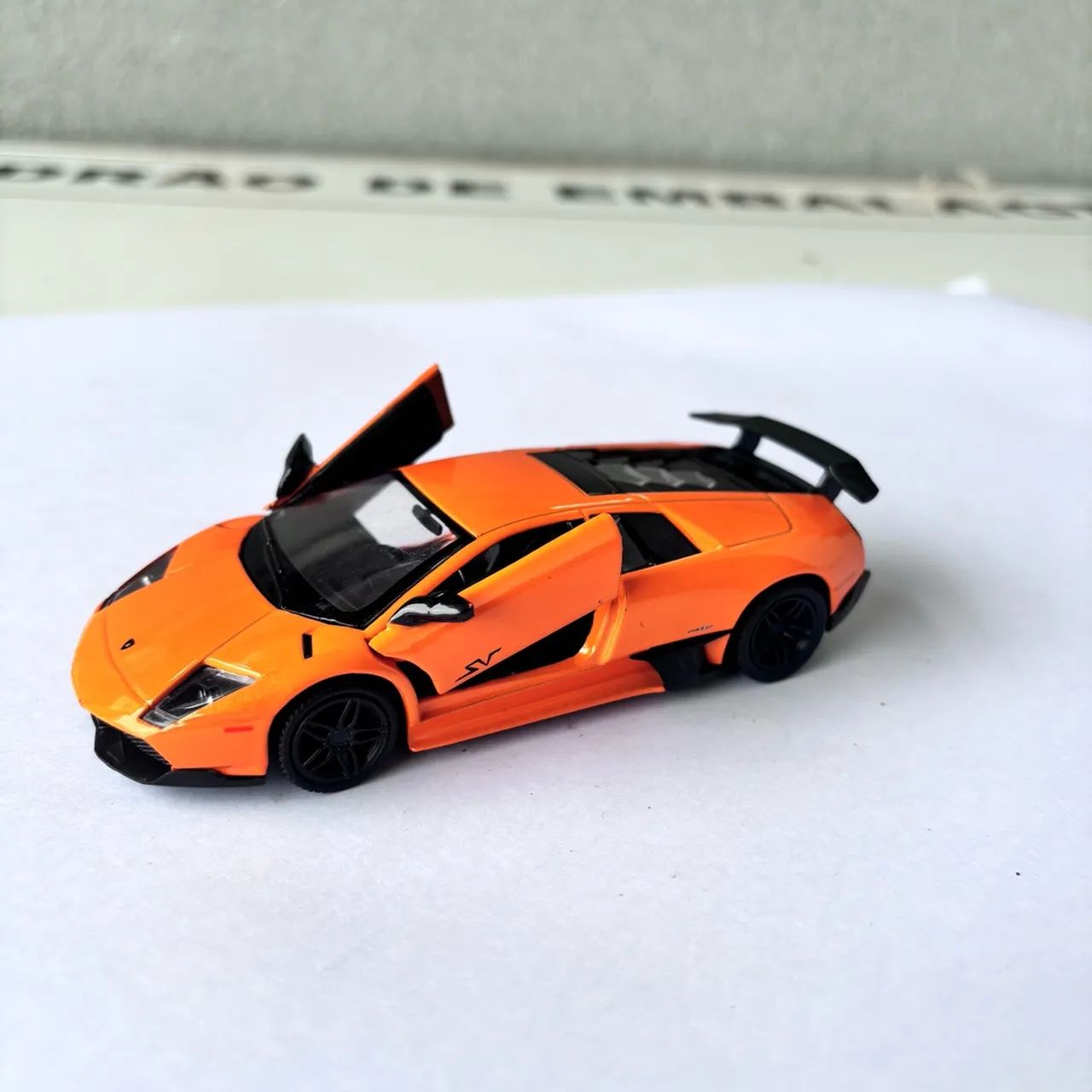 Miniatura Lamborghini Murciélago SV Laranja - Uni fortune - 1/39 - Foto 2