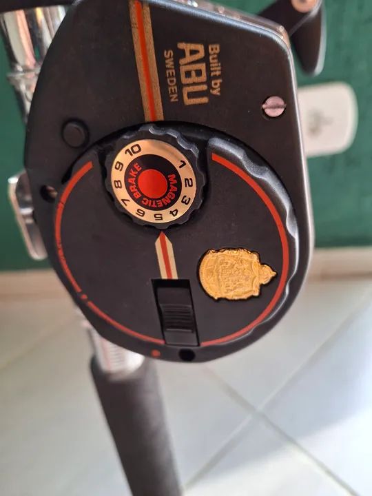 CARRETILHA ABU GARCIA COM VARA SEM USO - Foto 6