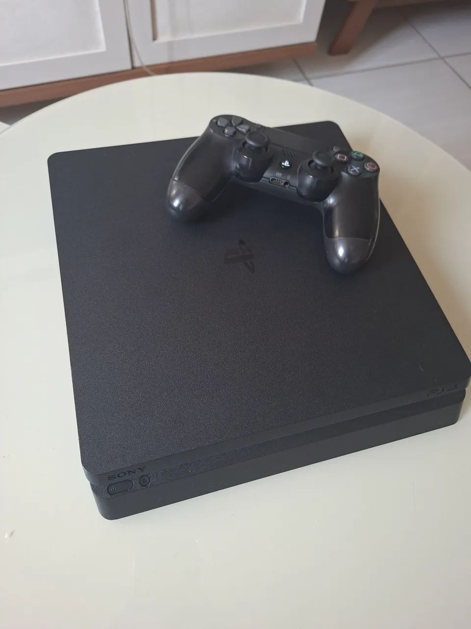 PS4 Slim 1Tb + 7 Jogos - Foto 2
