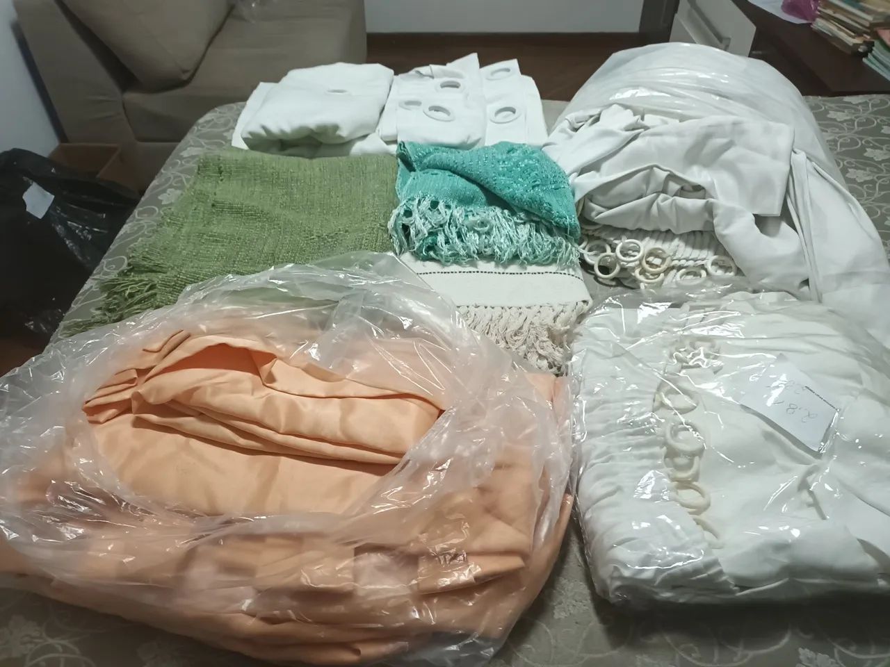 Cortinas. Tapetes. E mantas