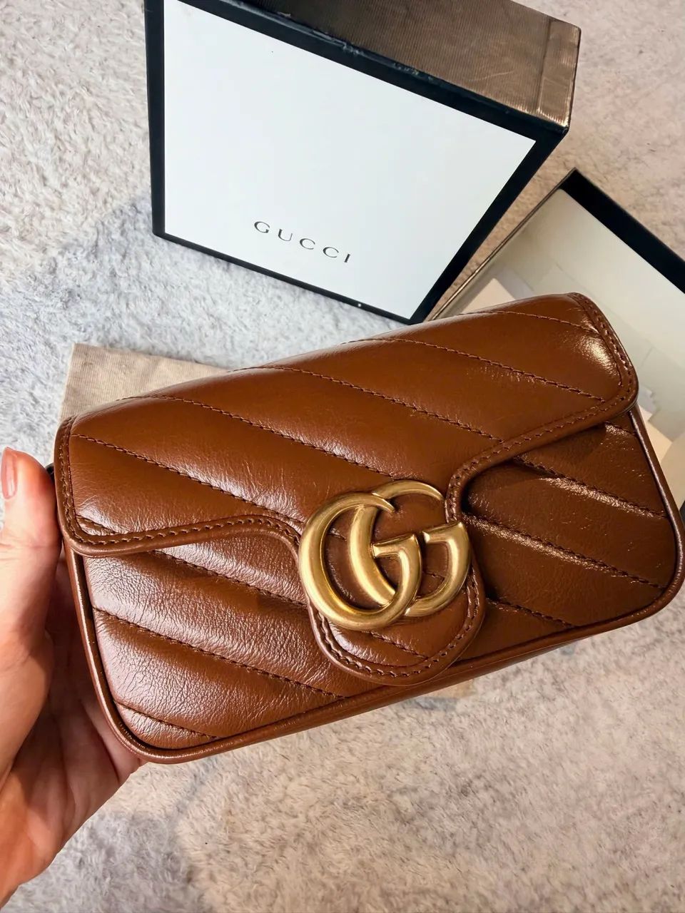 Bolsa Gucci GG Marmont Super Mini em Couro - Marrom