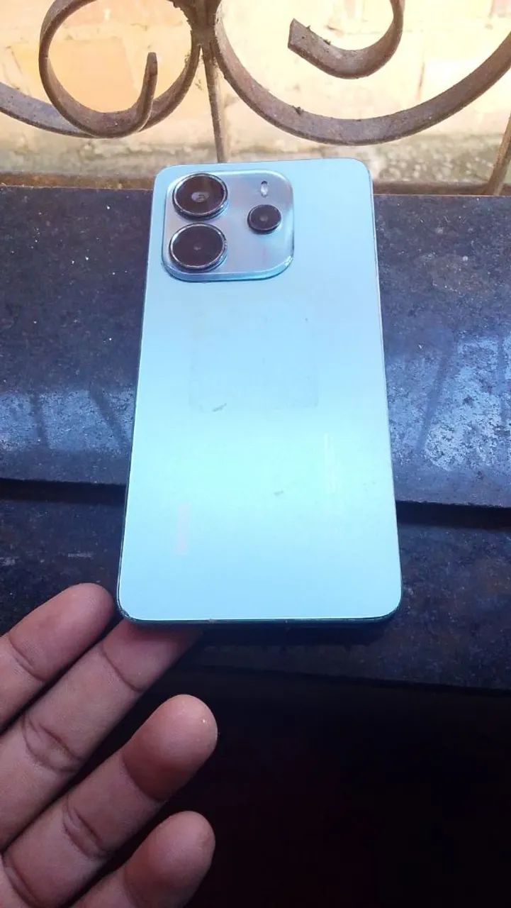 Celular redimi note 14 com placa queimada 