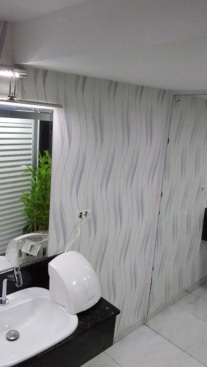 Colocador de papel de parede