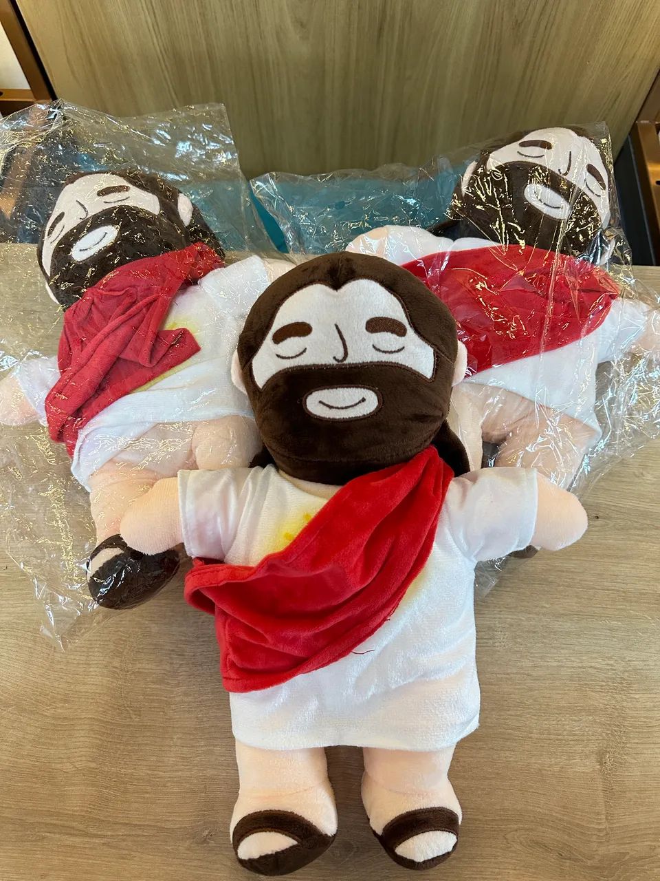 Boneco de Pelúcia Jesus com som e luz 