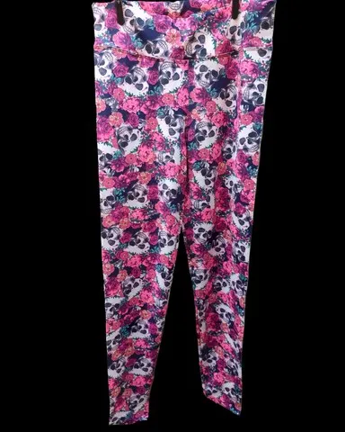 Legging caveiras e flores