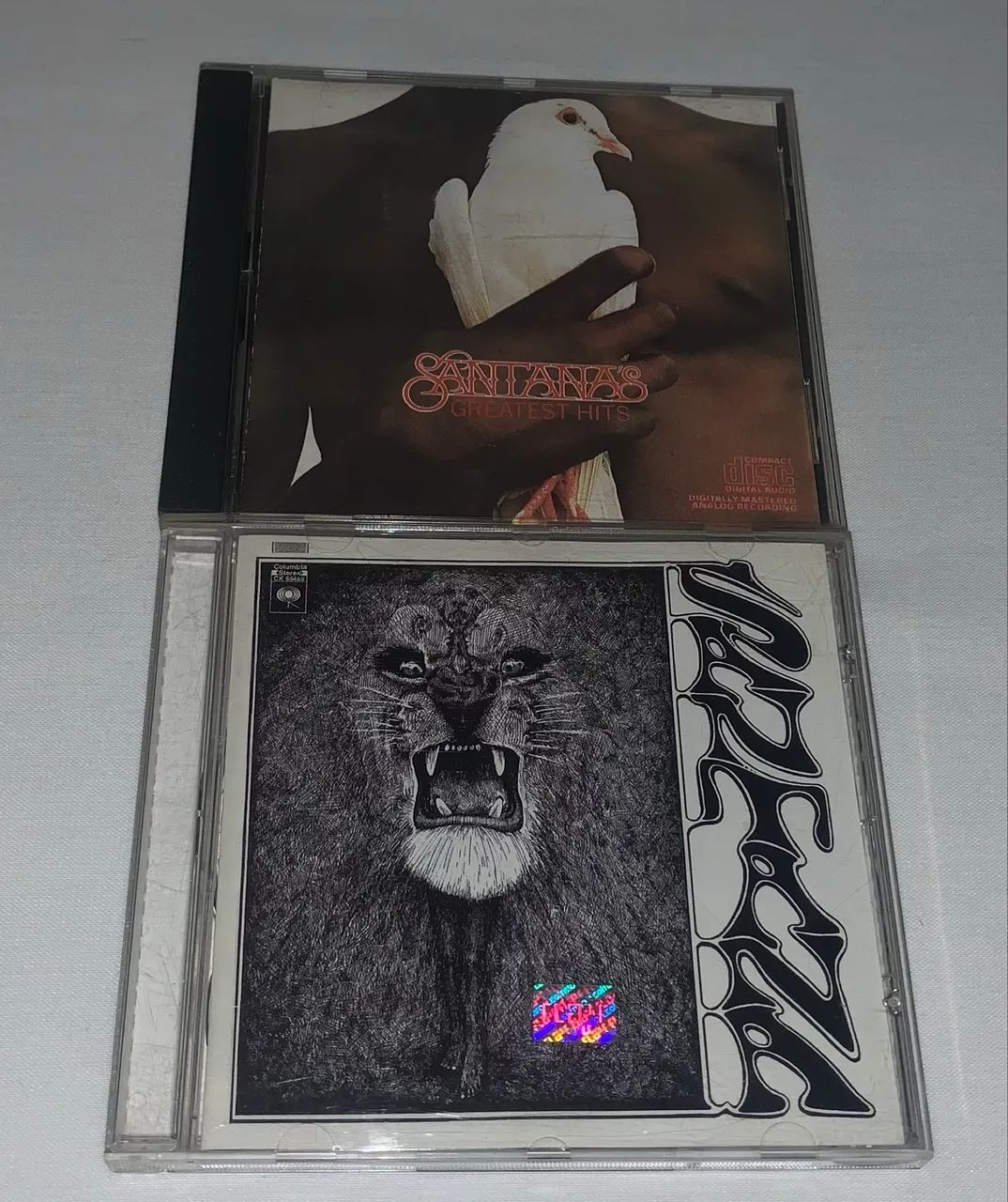 Cd Santana o primeiro ou o Gratest Hits impecáveis 