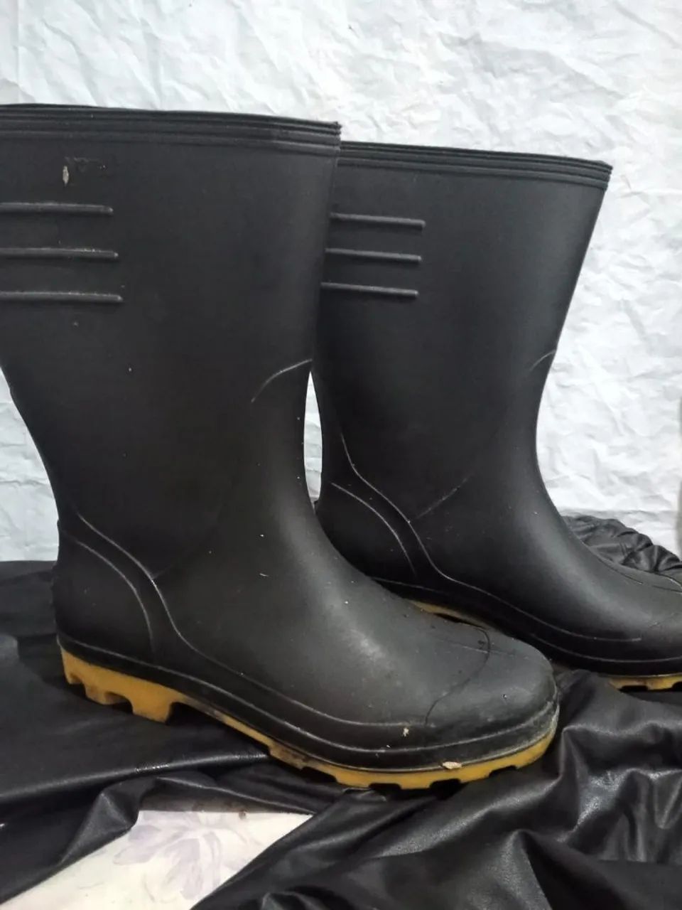 Capa de chuva com bota 